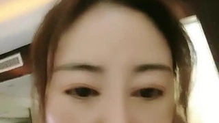 POV video of busty brunette giving a handjob and blowjob